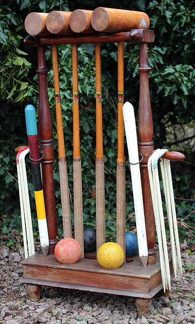 Appraisal: AN OLD CROQUET SET on a hardwood stand with four