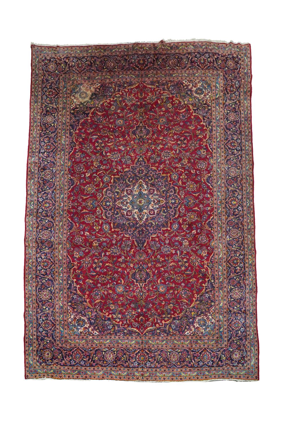 Appraisal: PERSIAN AREA RUGcenter medallion with a red field ' x