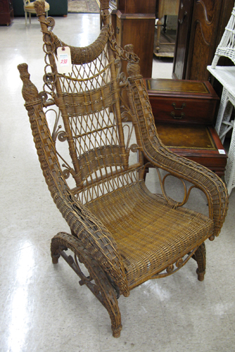 Appraisal: VICTORIAN STYLE PLATFORM WICKER ROCKER American early th century of