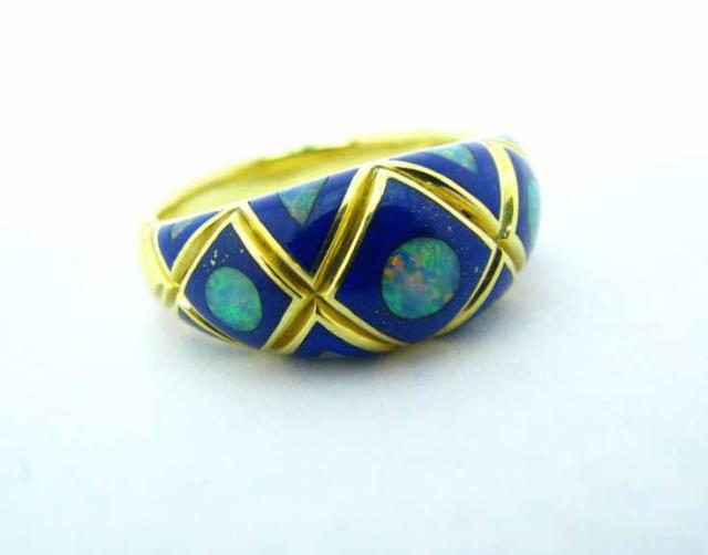 Appraisal: An K yellow gold ring with opal and lapis lazuli