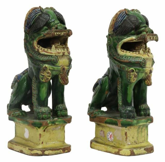 Appraisal: pair Chinese ceramic foo lions glazed in a Sancai palette