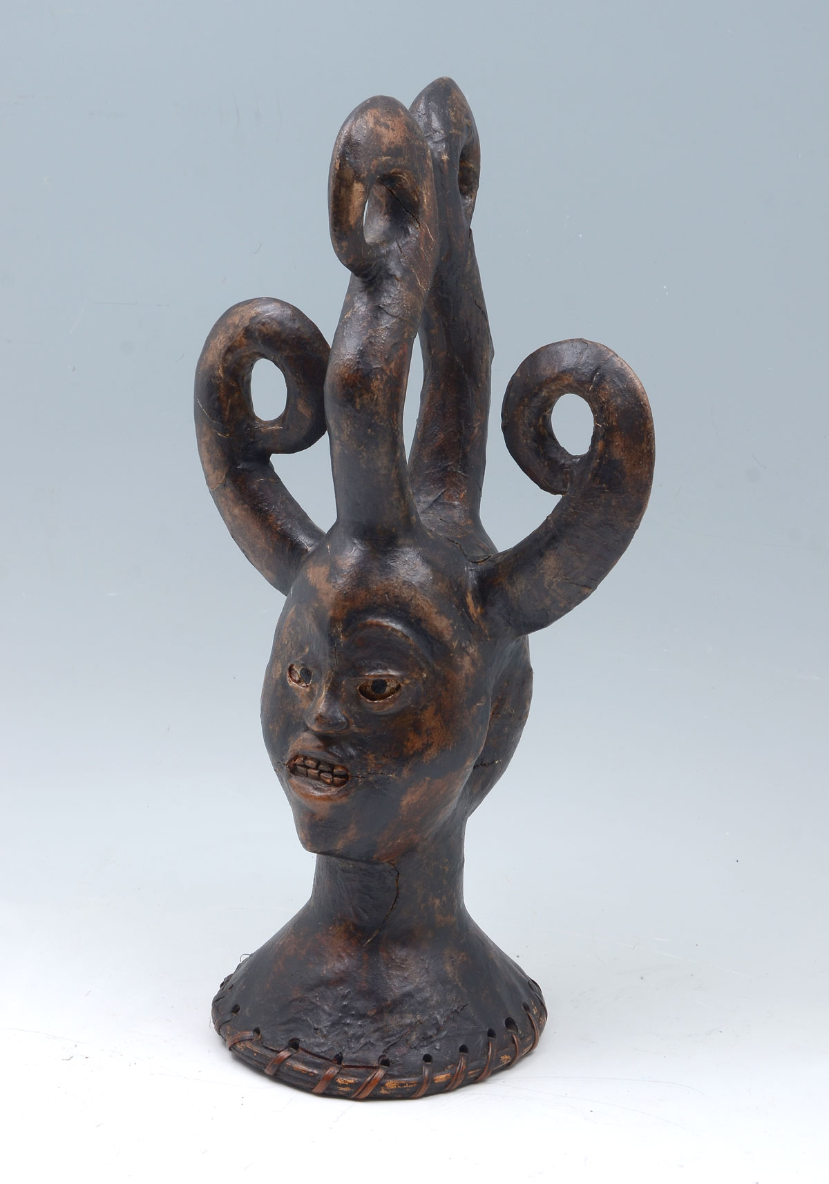 Appraisal: EKOI TRIBE NIGERIA ANTELOPE SKIN DOUBLE FACED HEADDRESS Surmounting Medusa