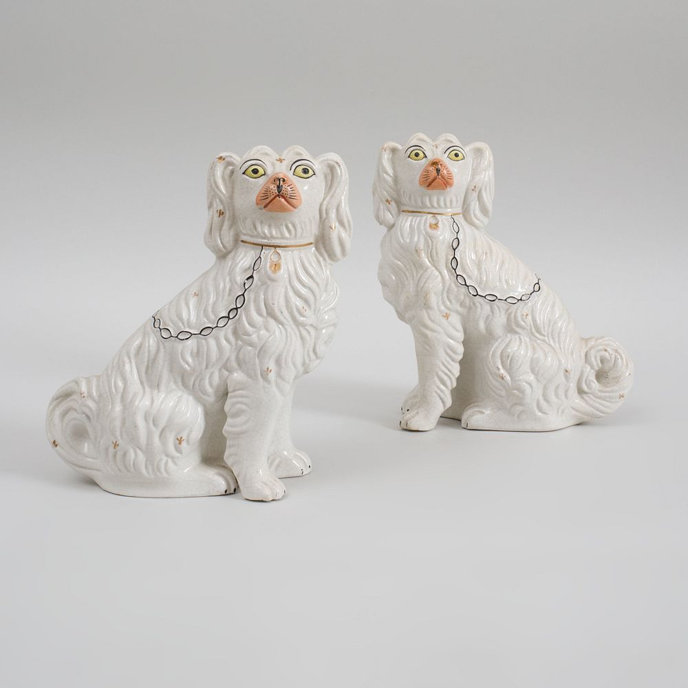 Appraisal: Pair of Staffordshire Figures of Seated Spaniels x x in