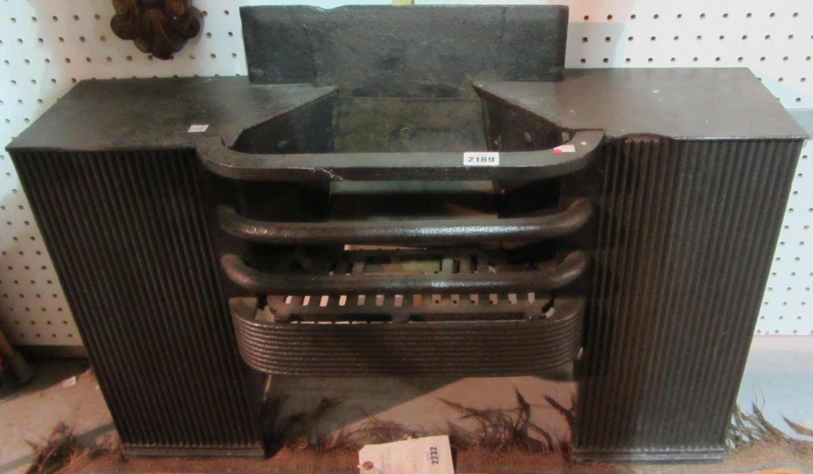 Appraisal: A th century iron fire grate