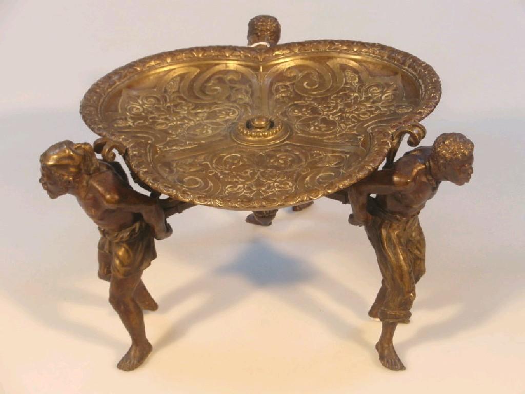 Appraisal: A thC French cast bronze tazza of trilobed form in