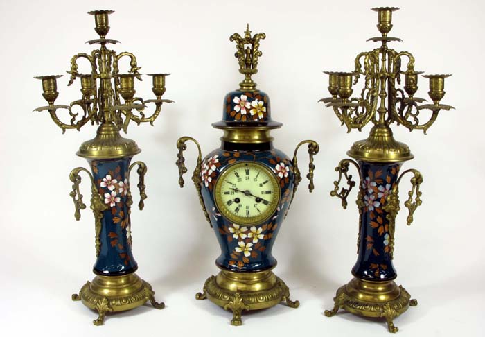 Appraisal: FRENCH THREE-PIECE CLOCK SET Each enameled with off white dogwood