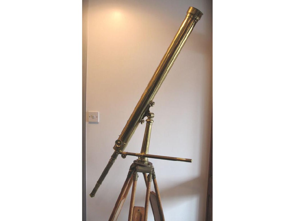 Appraisal: A LARGE BRASS TELESCOPE with an adjustable stand table stand