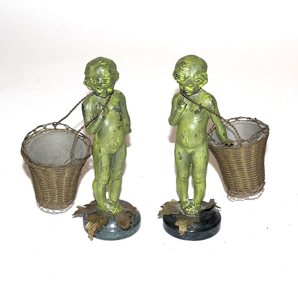 Appraisal: Pair of th Century Bronze Cupid Figures Each Having a