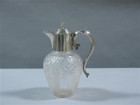 Appraisal: ENGLISH SILVER TOPPED SYRUP JUG London date letter rubbed and