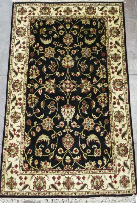 Appraisal: HAND KNOTTED ORIENTAL AREA RUG Indo-Persian overall floral design on