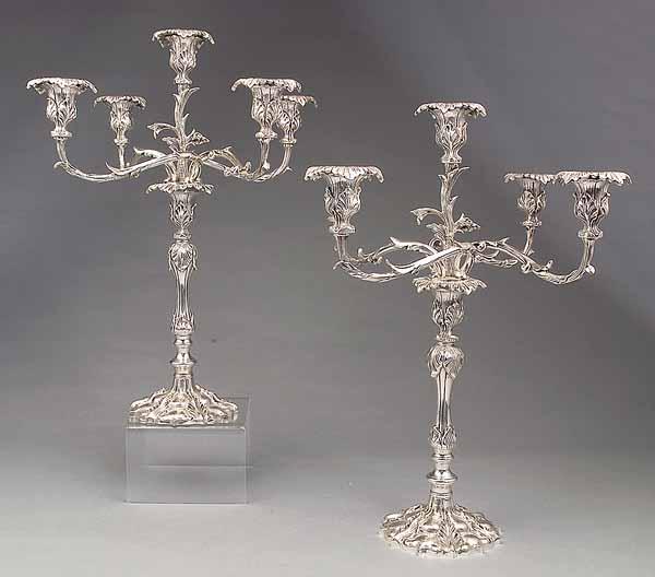 Appraisal: A Large Pair of Rococo-Style Silverplate Five-Light Candelabra cast leaf-decorated