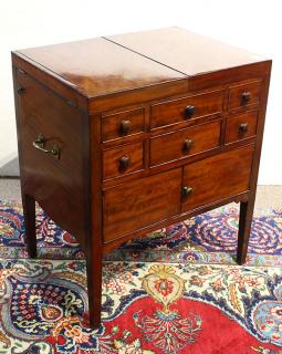 Appraisal: Regency style plum pudding mahogany collectors cabinet having a hinged