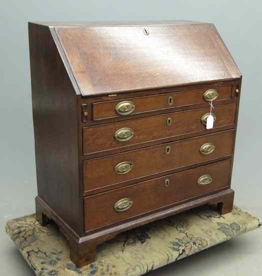 Appraisal: th c English oak four graduated drawers slant lid desk