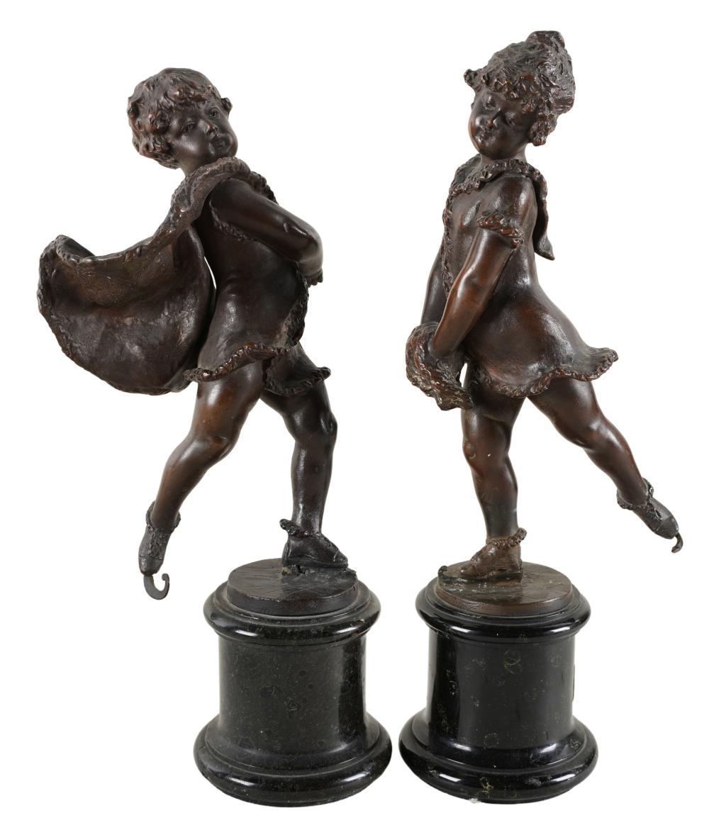 Appraisal: PAIR OF BRONZE SKATING FIGUREScomprising a boy signed illegibly F