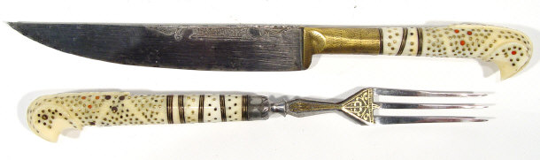 Appraisal: Middle Eastern bone handled knife and fork the handles with