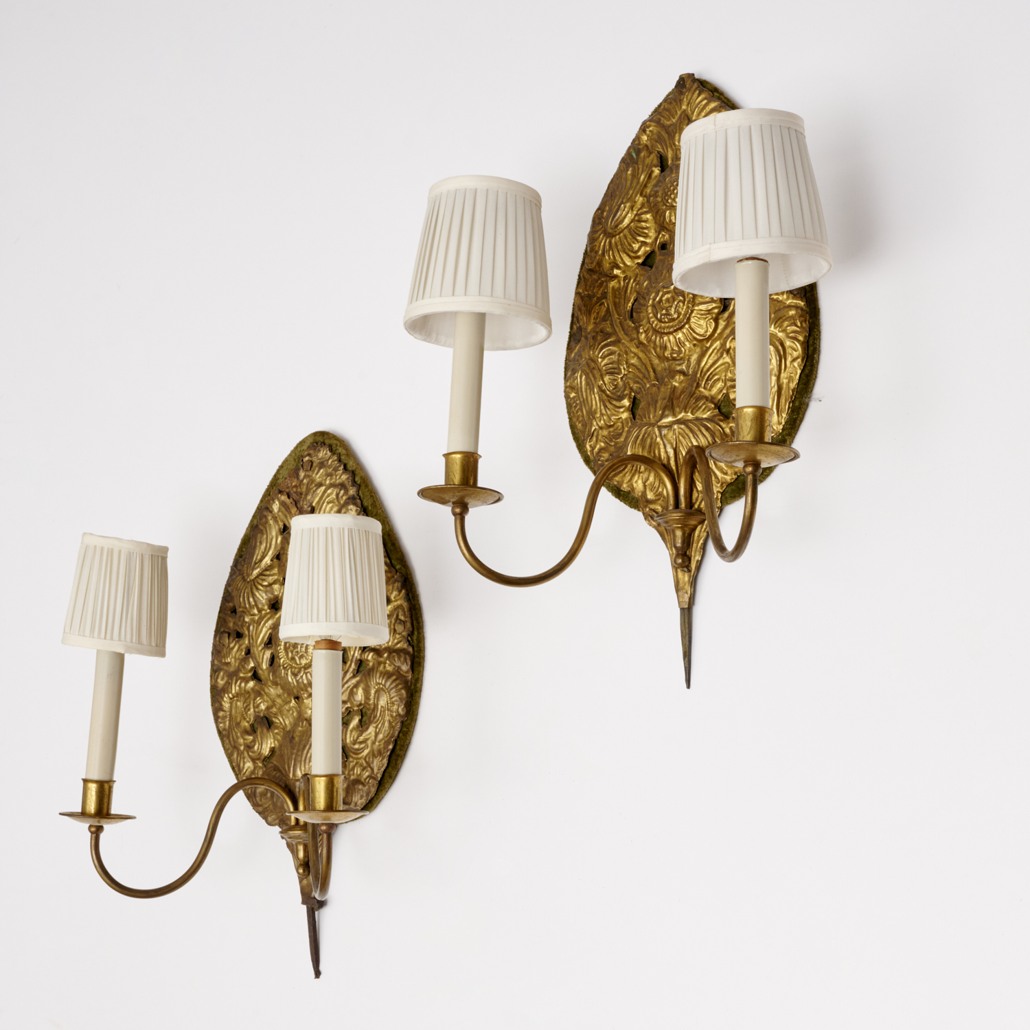 Appraisal: PAIR CONTINENTAL BAROQUE REPOUSSE BRASS SCONCES Possibly th c and