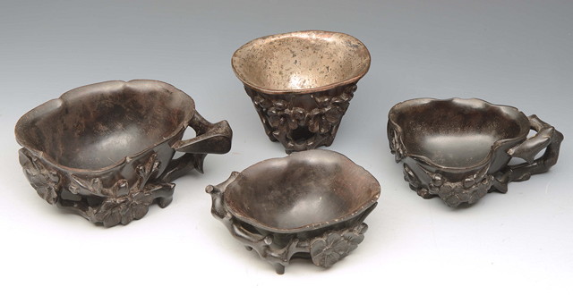 Appraisal: A COLLECTION OF FOUR CHINESE ZITAN LIBATION CUPS one with