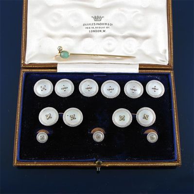 Appraisal: A pair of cufflinks and nine studs A gold stick