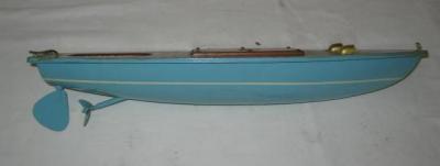 Appraisal: A clockwork speedboat Spray painted and varnished wood construction motor