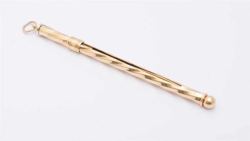 Appraisal: K GOLD CHAMPAGNE SWIZZLE STICK in approx grams Estimate -