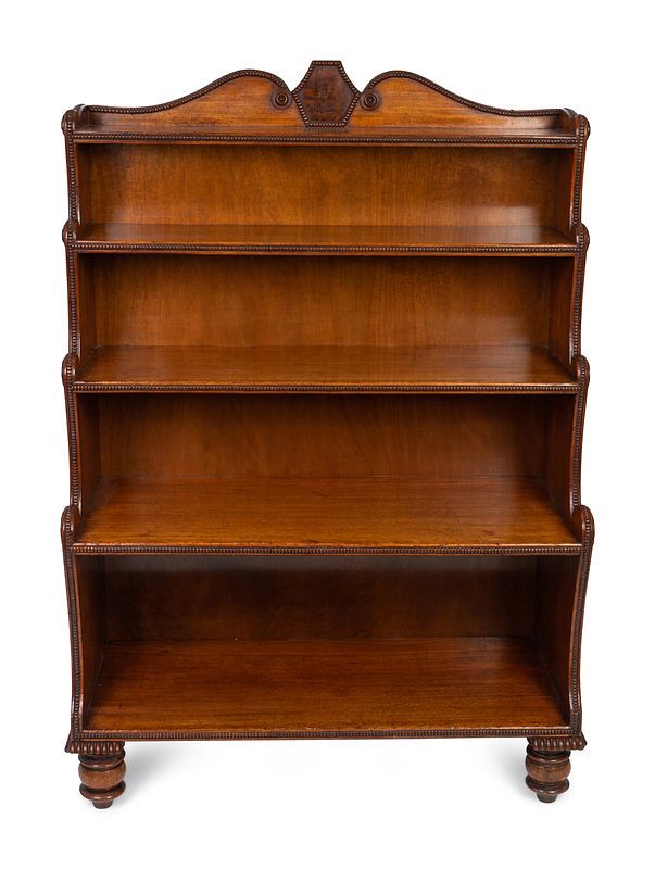 Appraisal: A George IV Carved Mahogany Waterfall Bookshelf In the Manner