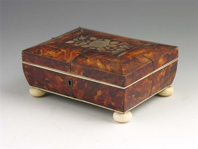 Appraisal: A late Regency tortoiseshell sewing box with pewter stringing and