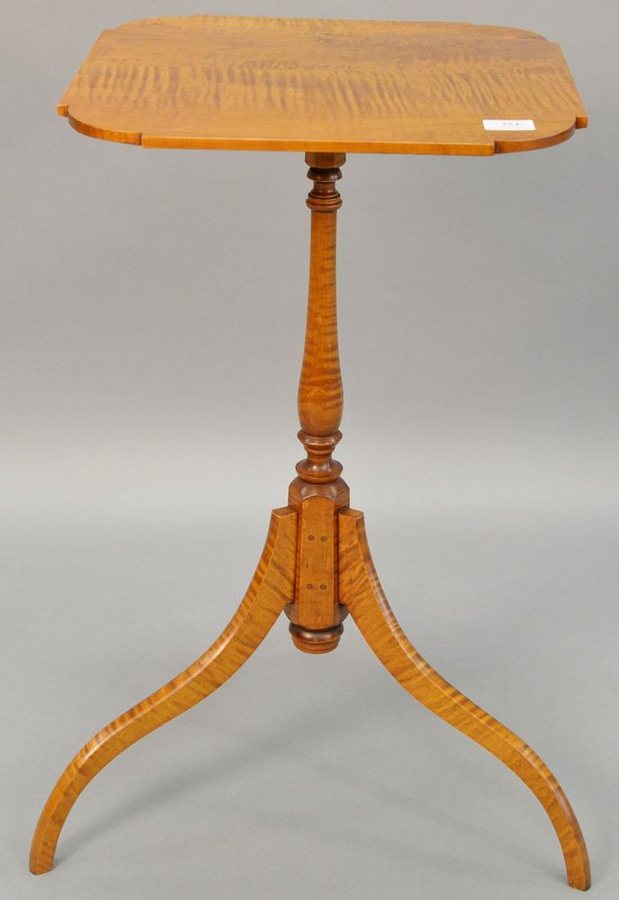 Appraisal: Eldred Wheeler tiger maple candle stand with shaped top h