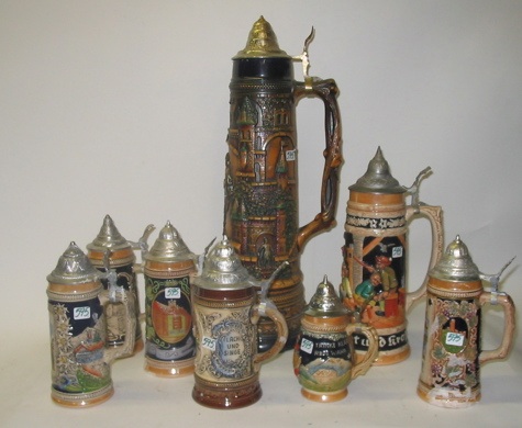 Appraisal: A COLLECTION OF GERMAN BEER STEINS all with various scenes