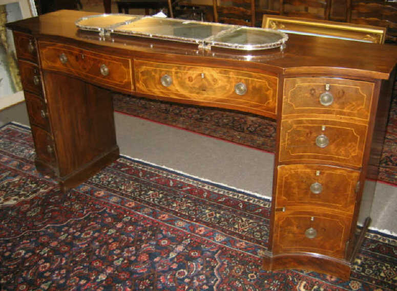 Appraisal: ENGLISH TH CENTURY MAHOGANY SECRETARY SIDEBOARD Serpentine front line inlaid