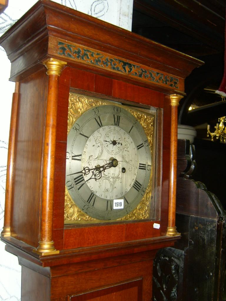 Appraisal: A Georgian oak longcase clock with mahogany cross banding containing