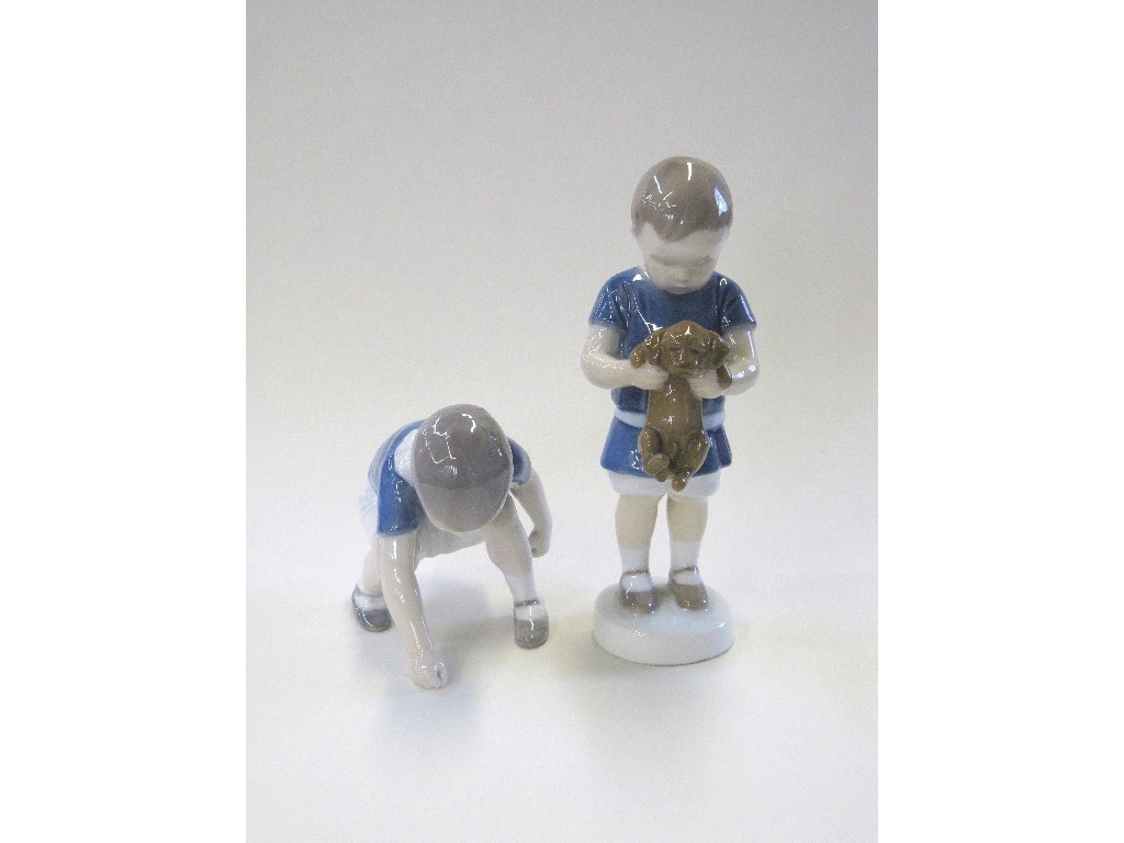 Appraisal: Two Bing and Grondhal figures of boys one holding a