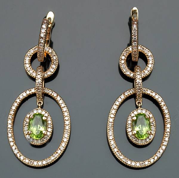 Appraisal: A pair of peridot diamond and k gold earrings estimated