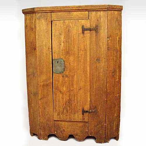 Appraisal: A Czechoslovakian Country Pine Single Door Cupboard having a molded