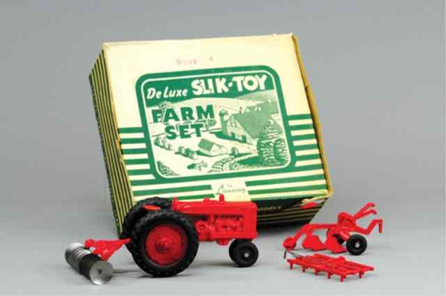 Appraisal: SLIK-TOY BOXED FARM SET Unused toy set die-cast tractor and