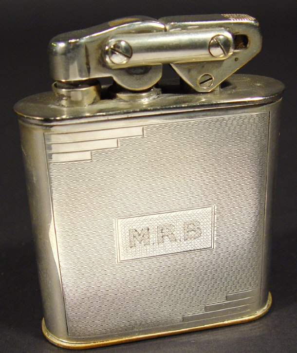 Appraisal: Art Deco Elisorn AutoTank table lighter with engine turned decoration