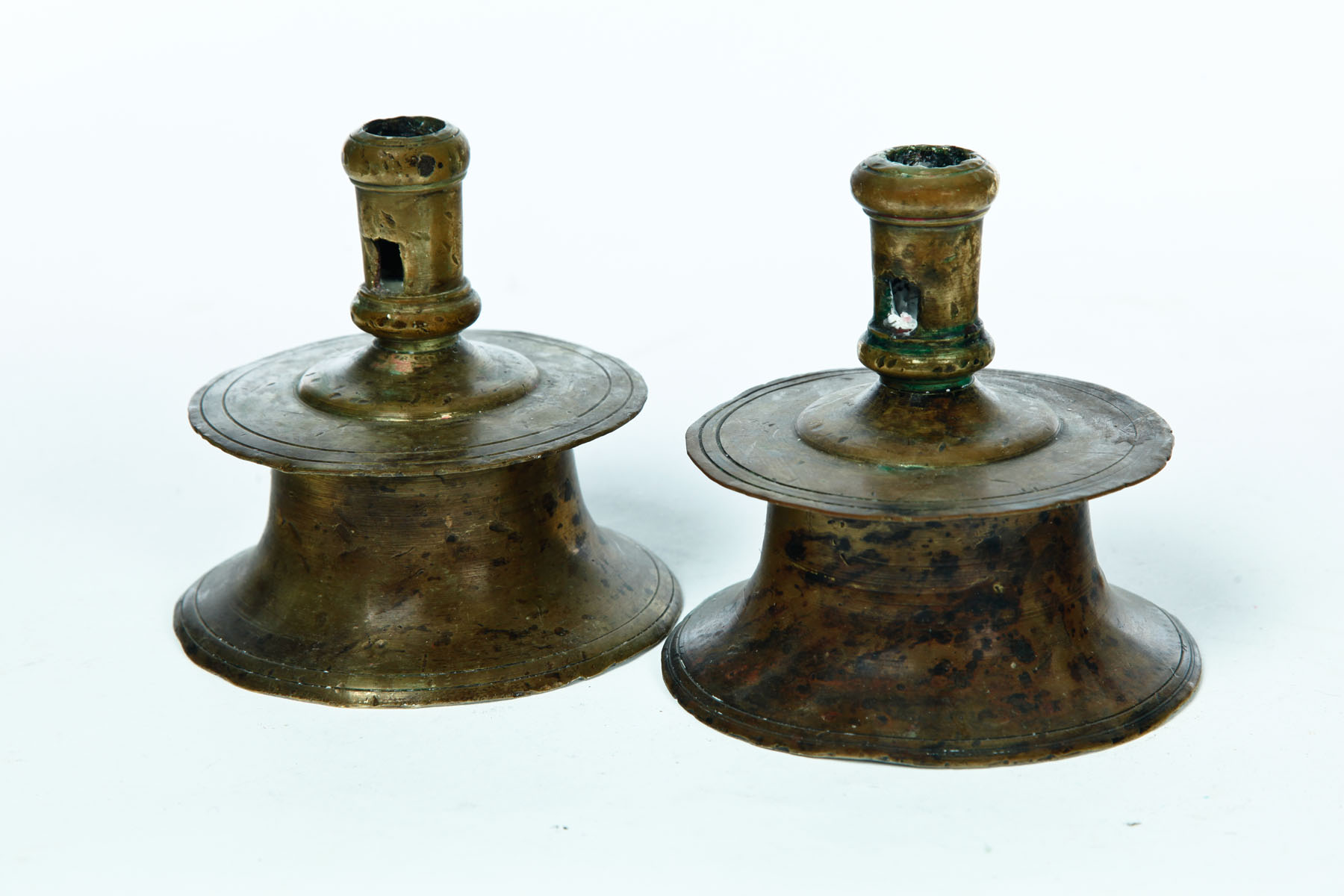 Appraisal: PAIR OF CAPSTAN CANDLESTICKS European late th-early th century bell