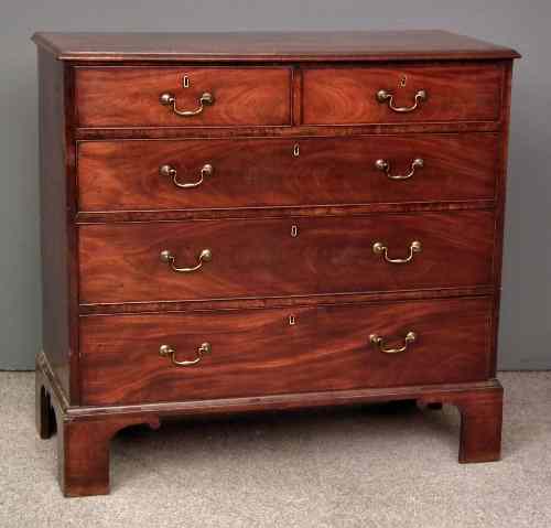 Appraisal: A George III mahogany chest of drawers the top with