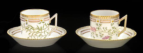 Appraisal: A pair of Royal Copenhagen Flora Danica porcelain chocolate cups