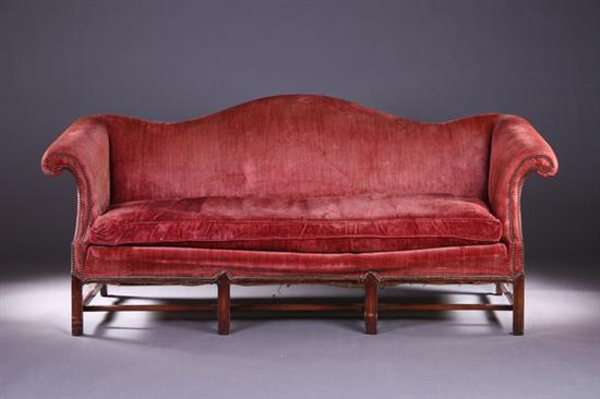 Appraisal: CHIPPENDALE-STYLE NAILED VELVET CAMEL-BACK SOFA Early th century Marlborough legs