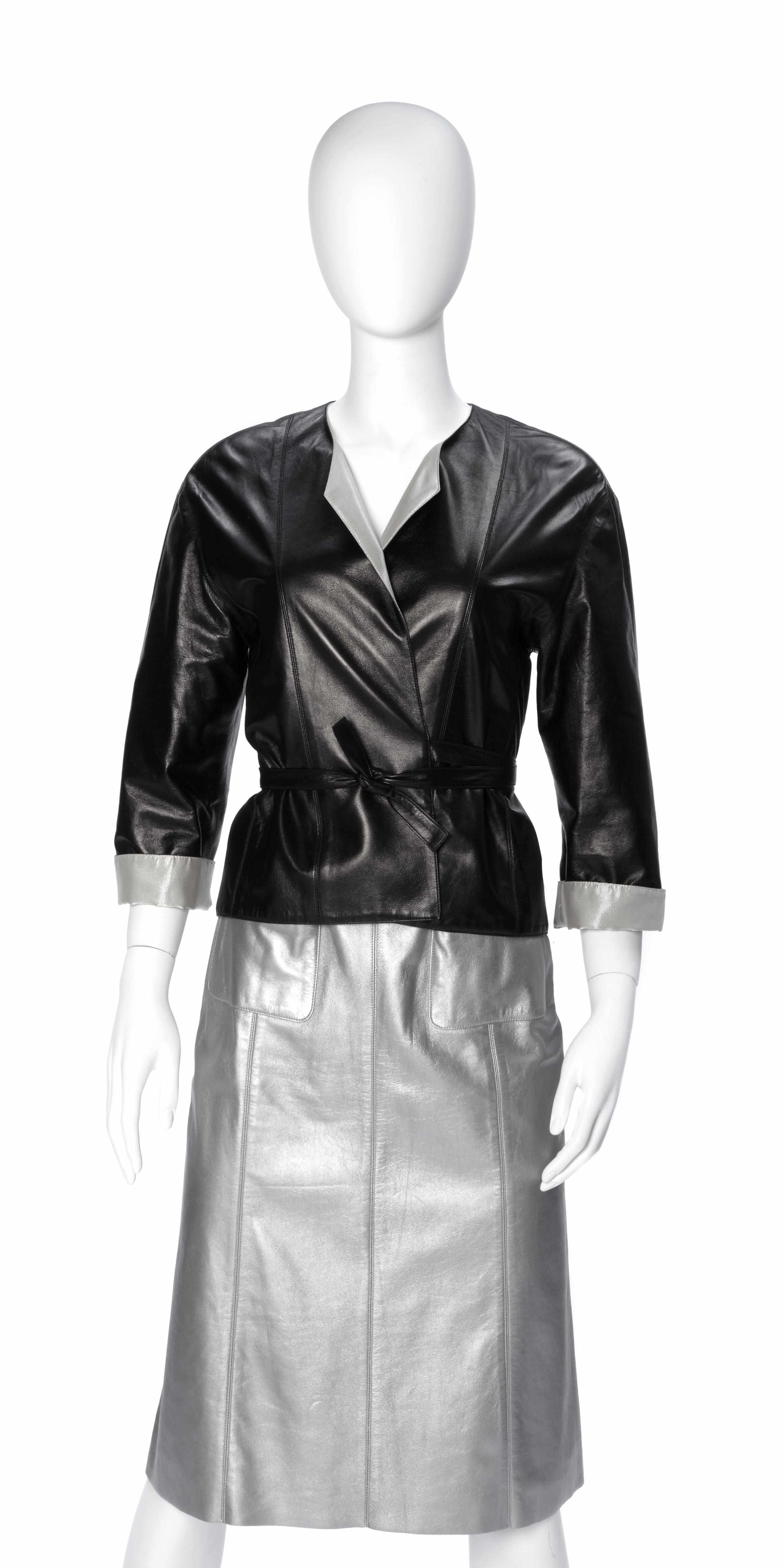 Appraisal: A Chanel silver and black leather wrap jacket size together