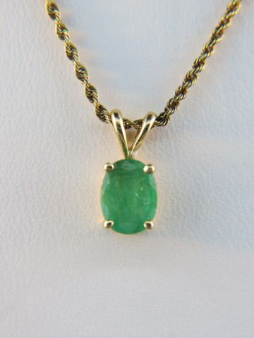 Appraisal: Emerald Pendant oval gem weighing over carats chain all k