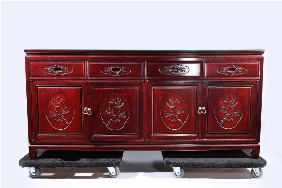 Appraisal: Carved Chinese cherry wood drawer dresser included with glass tabletop