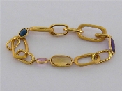 Appraisal: An carat gold and multi gem bracelet by Marco Bicego