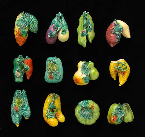 Appraisal: A group of twelve enameled porcelain miniature models of vegetables