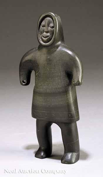 Appraisal: An Alaskan Inuit Soapstone Carving of a Standing Hunter dark