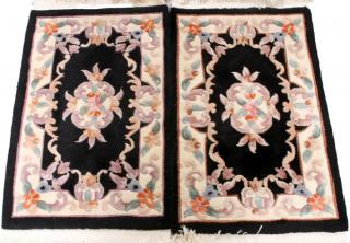 Appraisal: CHINESE ORIENTAL WOOL RUGS PAIR W ' L ' Black