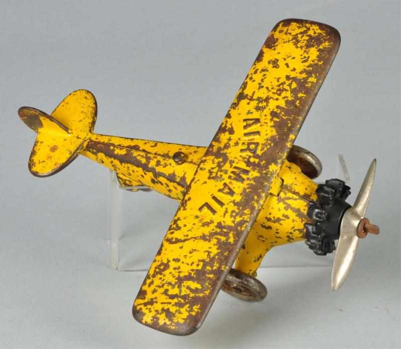 Appraisal: Cast Iron Kenton Air Mail Airplane Toy Description American Embossed