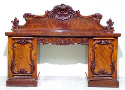 Appraisal: A MAHOGANY DINING TABLE of D ended form with two