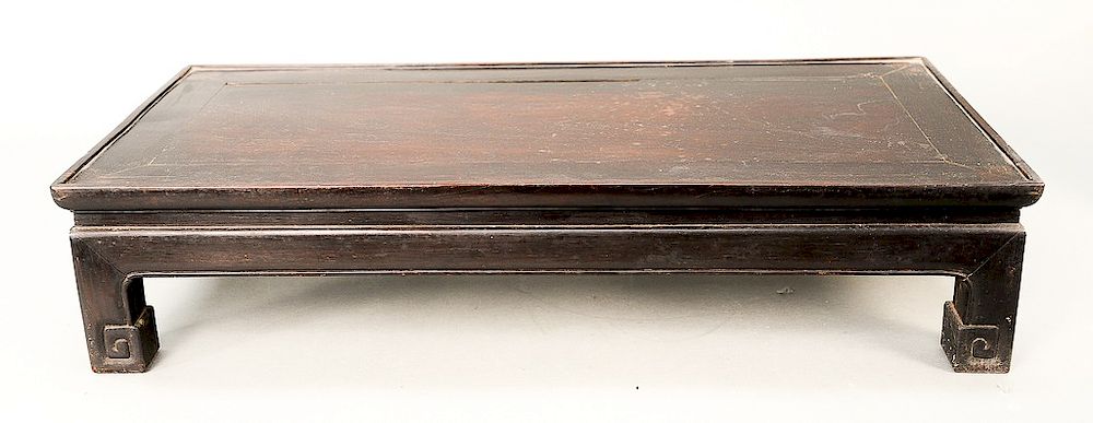 Appraisal: Chinese hardwood rectangular stand with carved feet ht in top