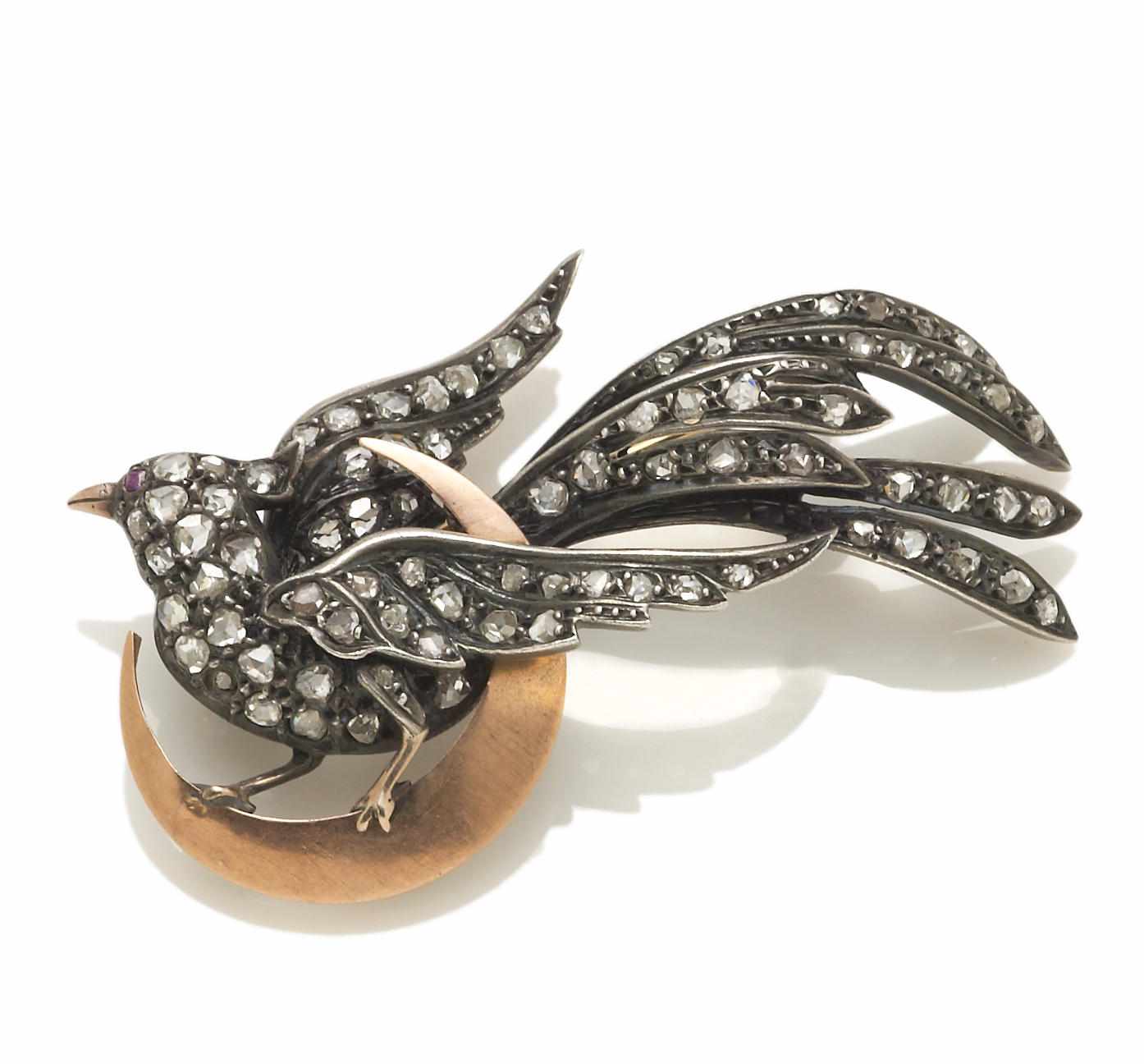 Appraisal: A diamond bird on moon brooch composed of pav-set rose-cut